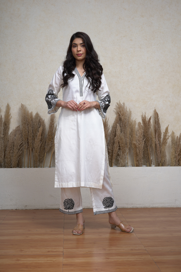 Pure white and black Glaze cotton machine embroidered cotton suit.